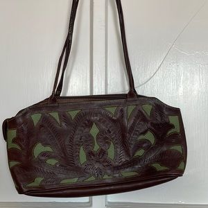 Leather handbag. Like new. Never used.